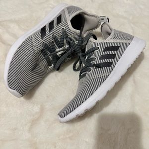Gently worn Adidas. Gray and white pin stripe. Size 8.5